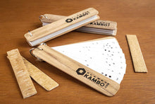 Load image into Gallery viewer, Handmade Kambo burning stencils with durable plastic sheets, ring-bound and enclosed in soft wooden paneling