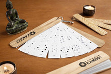 Load image into Gallery viewer, Handmade Kambo burning stencils with durable plastic sheets, ring-bound and enclosed in soft wooden paneling
